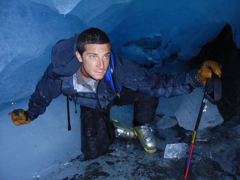 Man exploring ice cave
