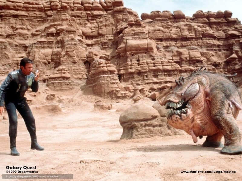 Man facing alien creature
