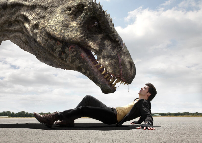 Man Facing Dinosaur