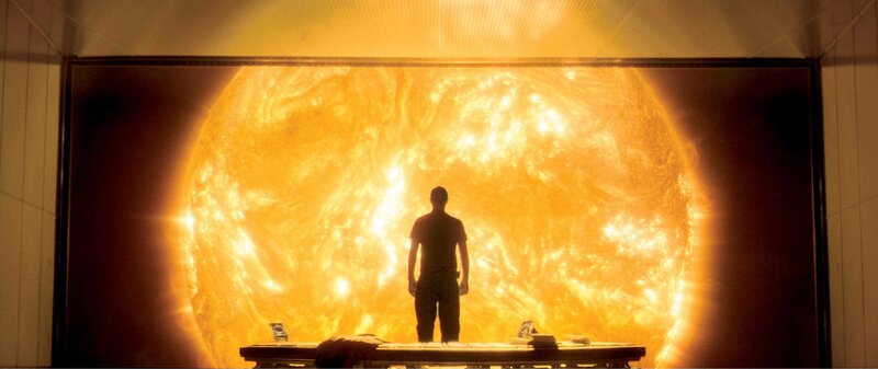 Man facing the sun