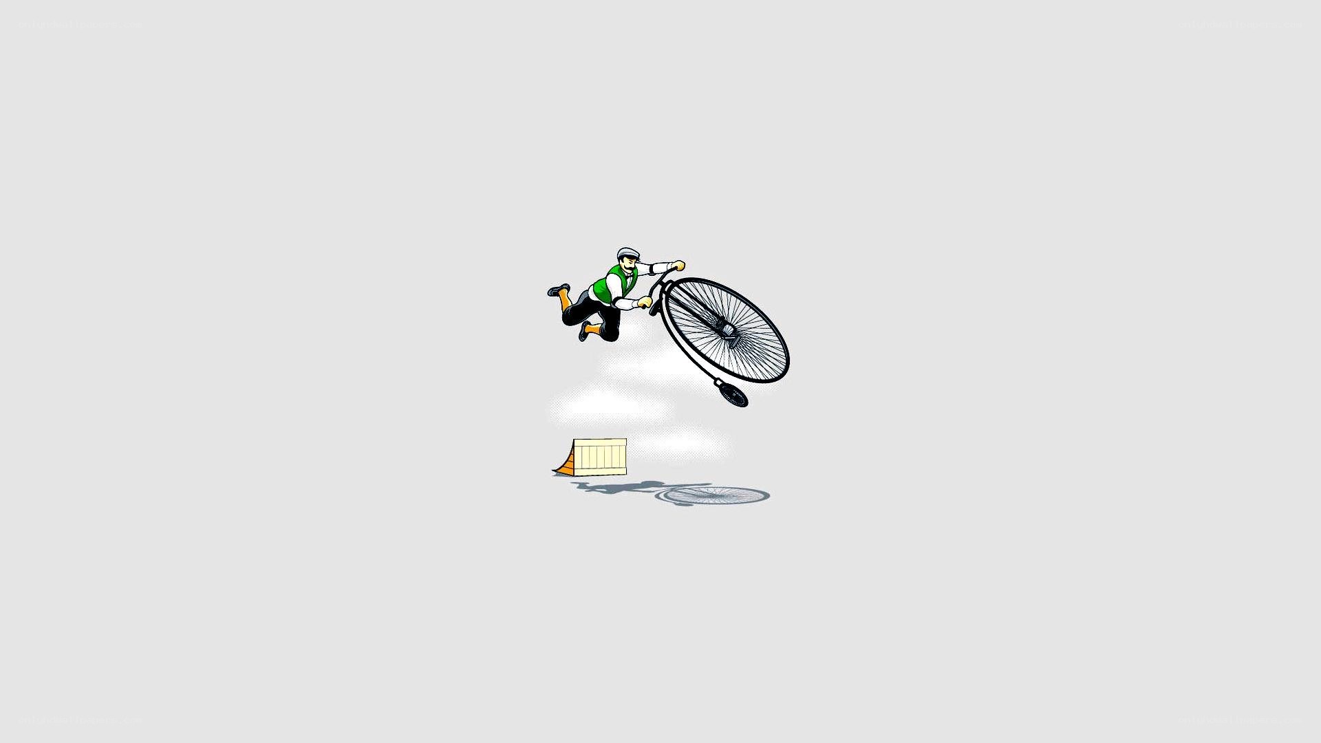 Man falling from bicycle