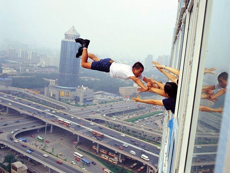 Man falling from skyscraper