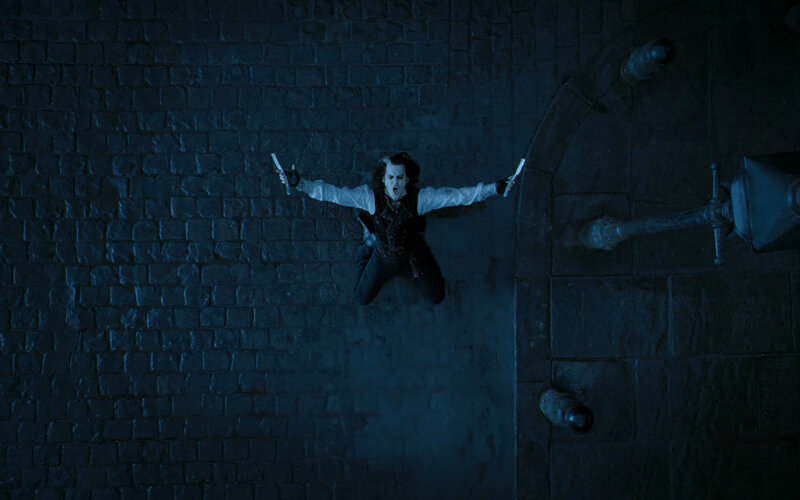 Man falling with knives