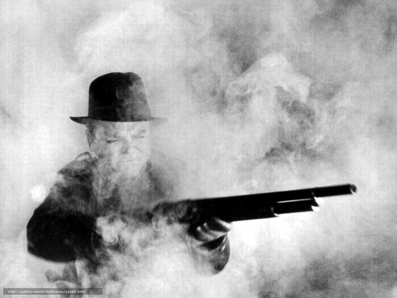 Man firing shotgun in smoke