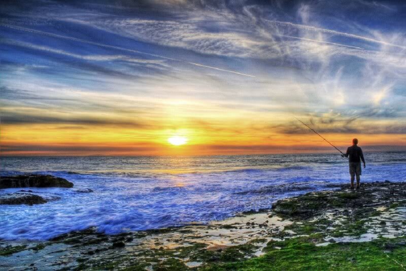 Man Fishing at Sunset — Blue