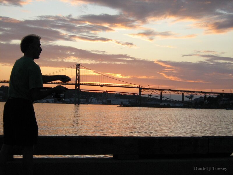 Man fishing at sunset