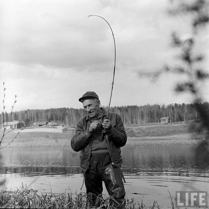 Man fishing by a lake