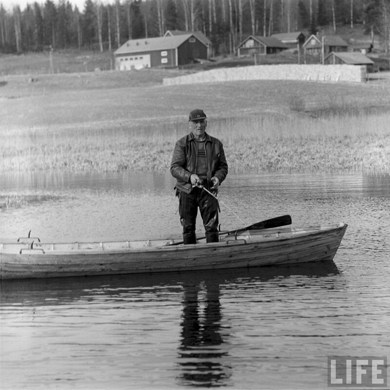 man fishing in a boat