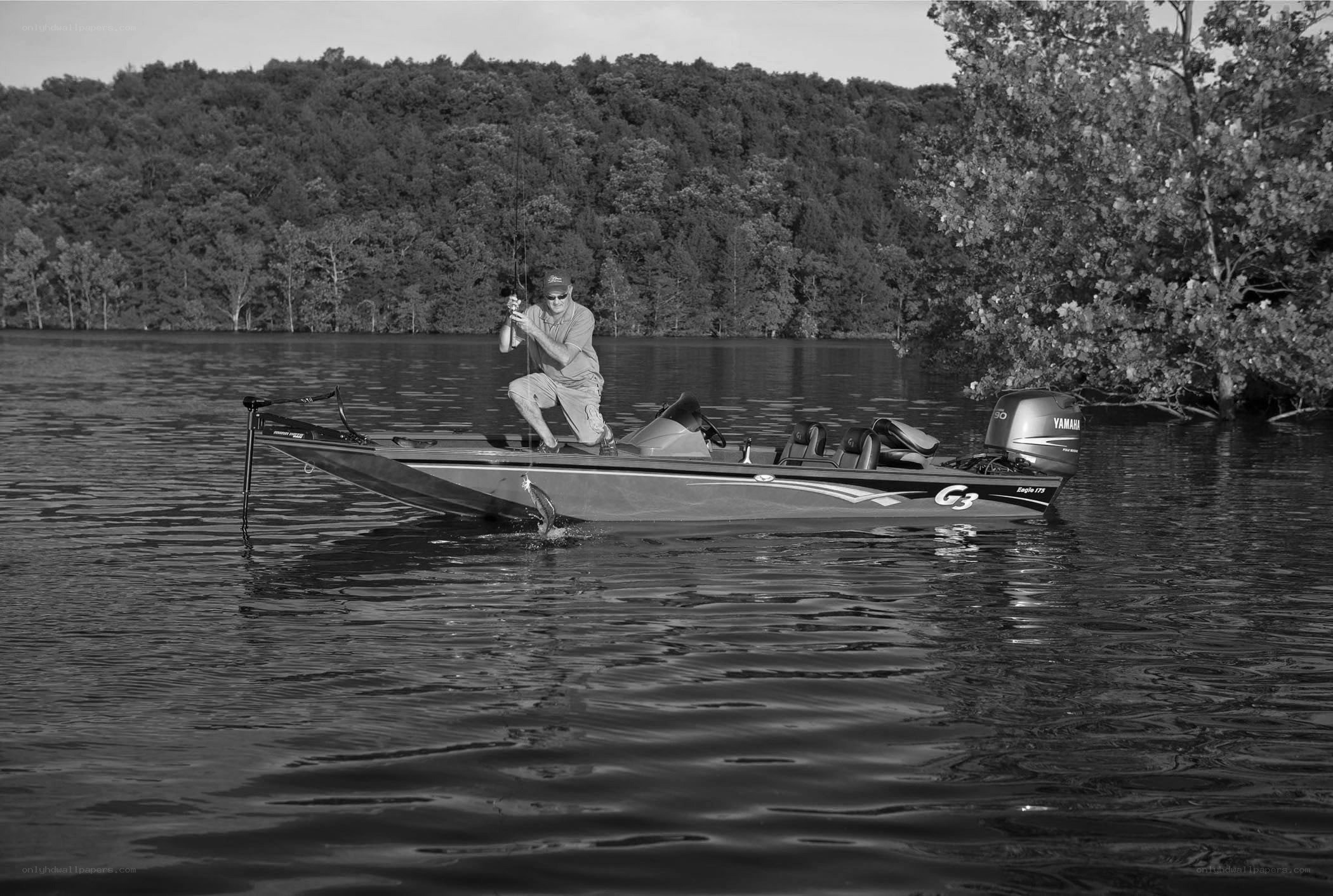 man fishing on a boat