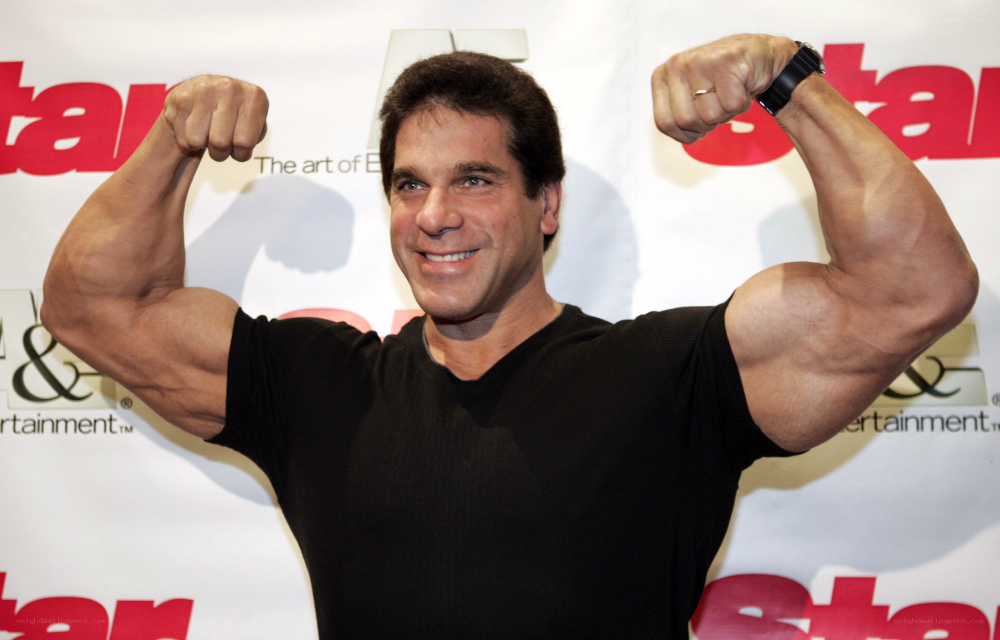 man flexing muscles