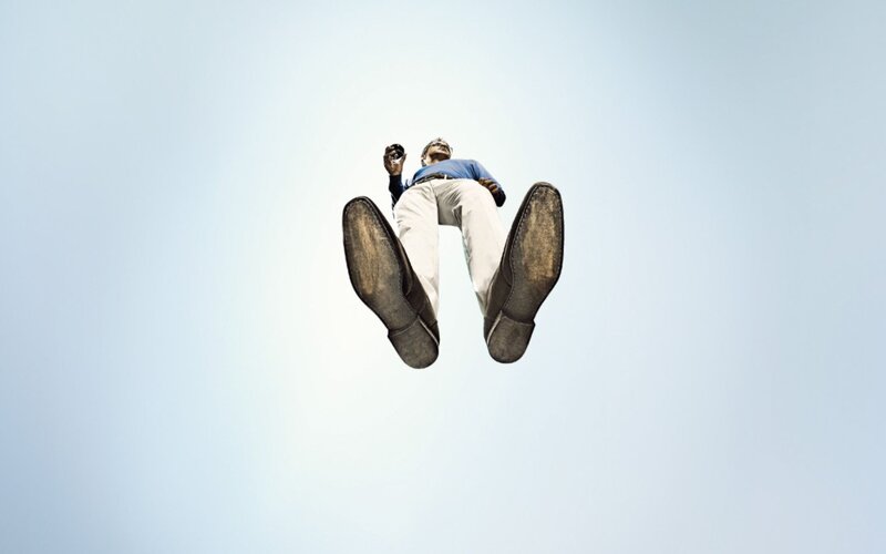 man floating in the sky