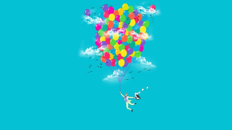 Man Floating with Balloons