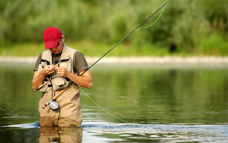 Man fly fishing in a river
