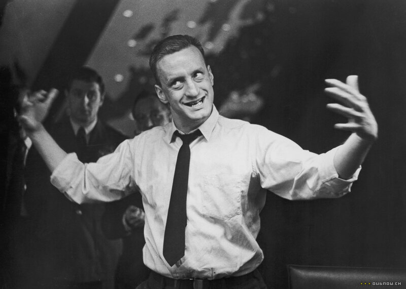 Man gesturing at an event