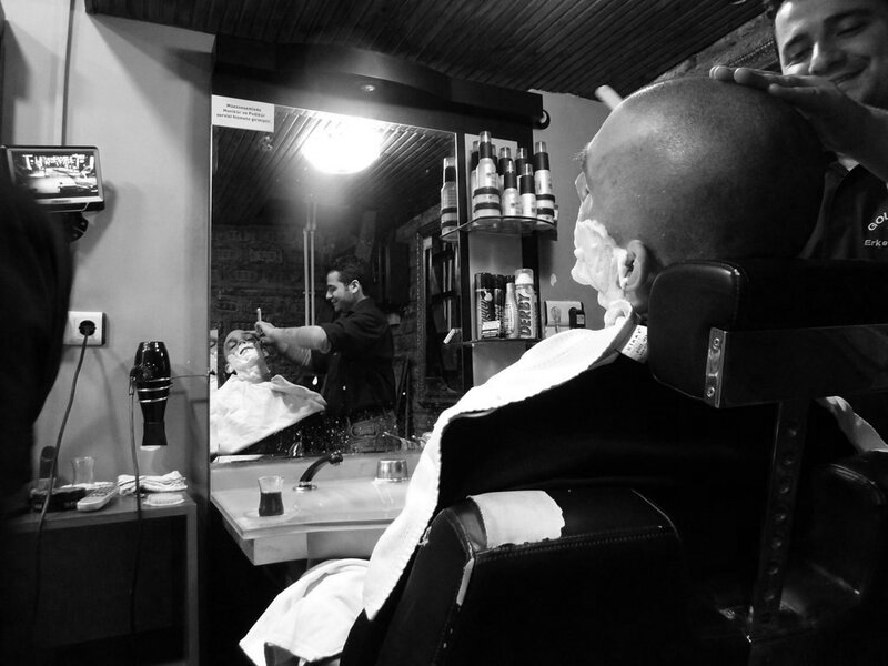 Man Getting a Shave — Black