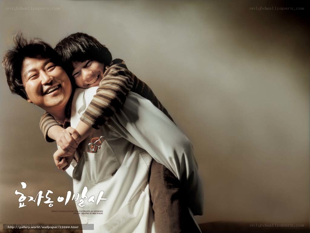 man giving child a piggyback ride