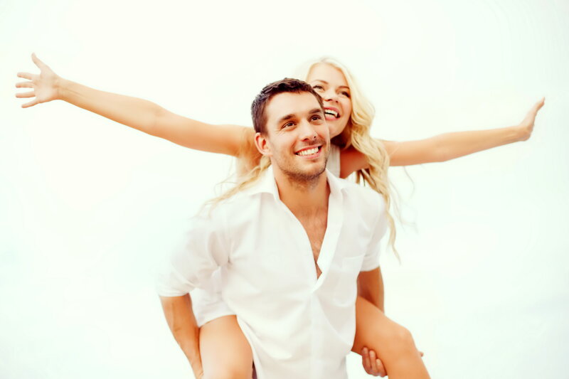 Man Giving Piggyback Ride — White