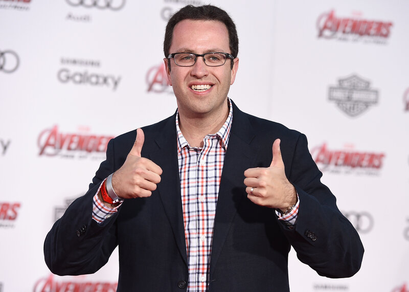 Man giving thumbs up at premiere