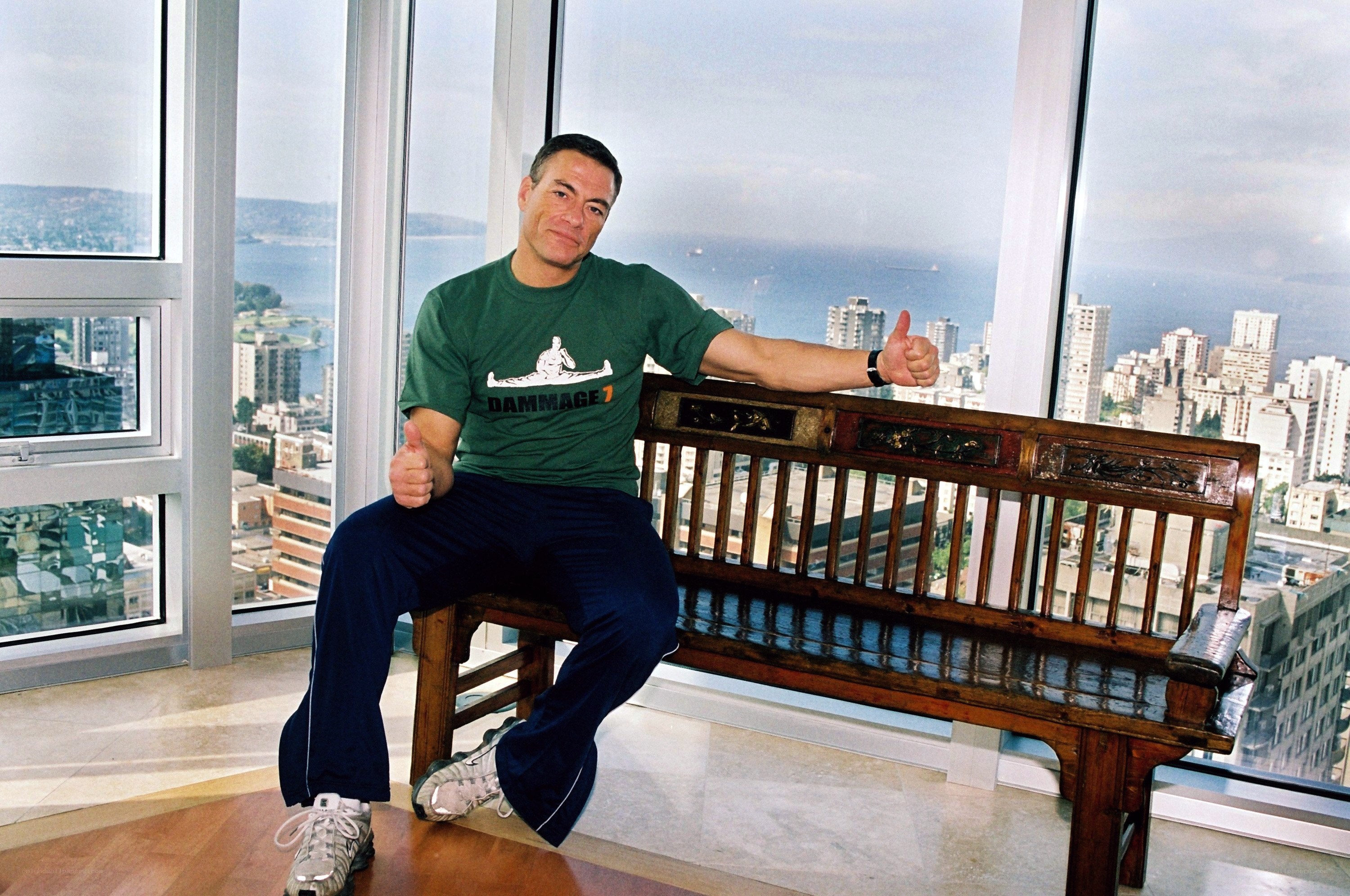 Man giving thumbs up on bench