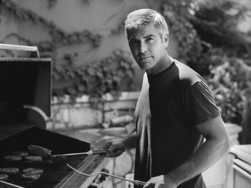Man Grilling Meat