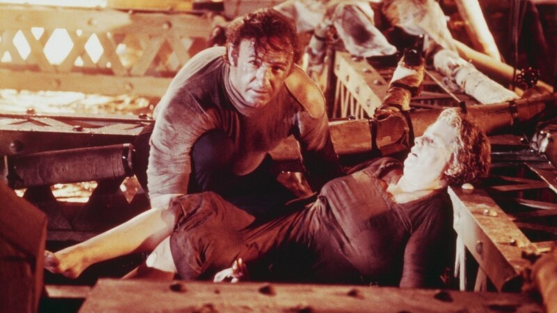 Man Helping Injured Woman