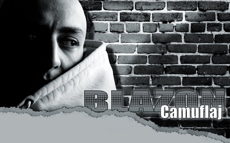 man hiding behind blanket