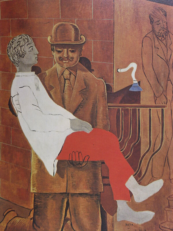 Man holding a boy in a room