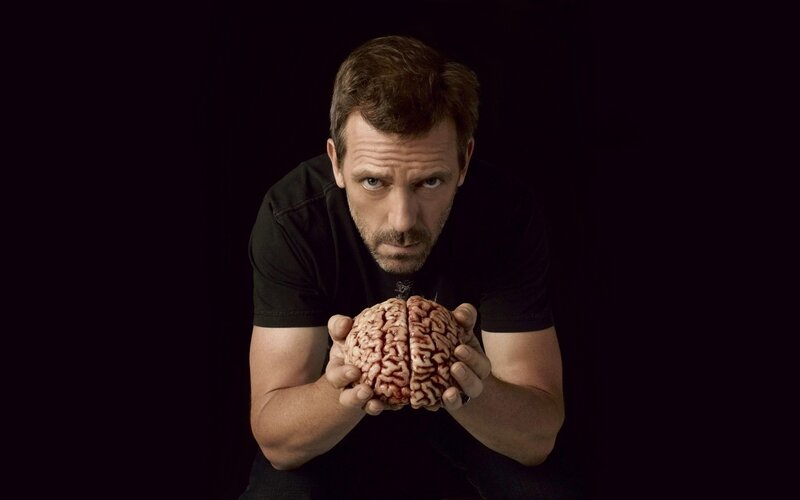 man holding a brain
