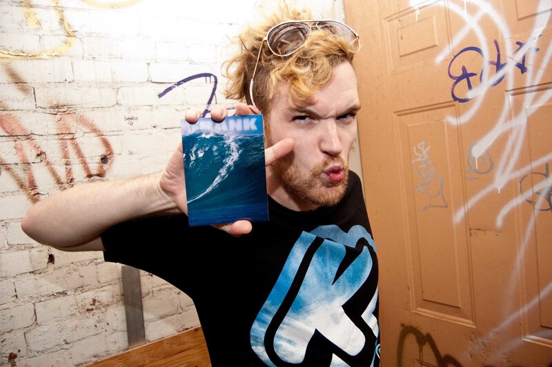 man holding a card with wave