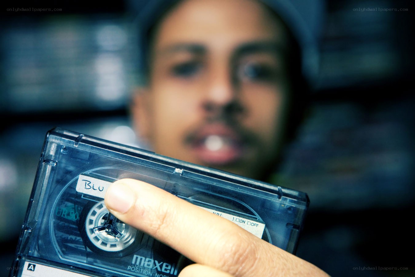 Man holding a cassette tape