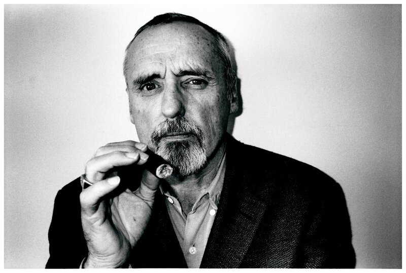 man holding a cigar
