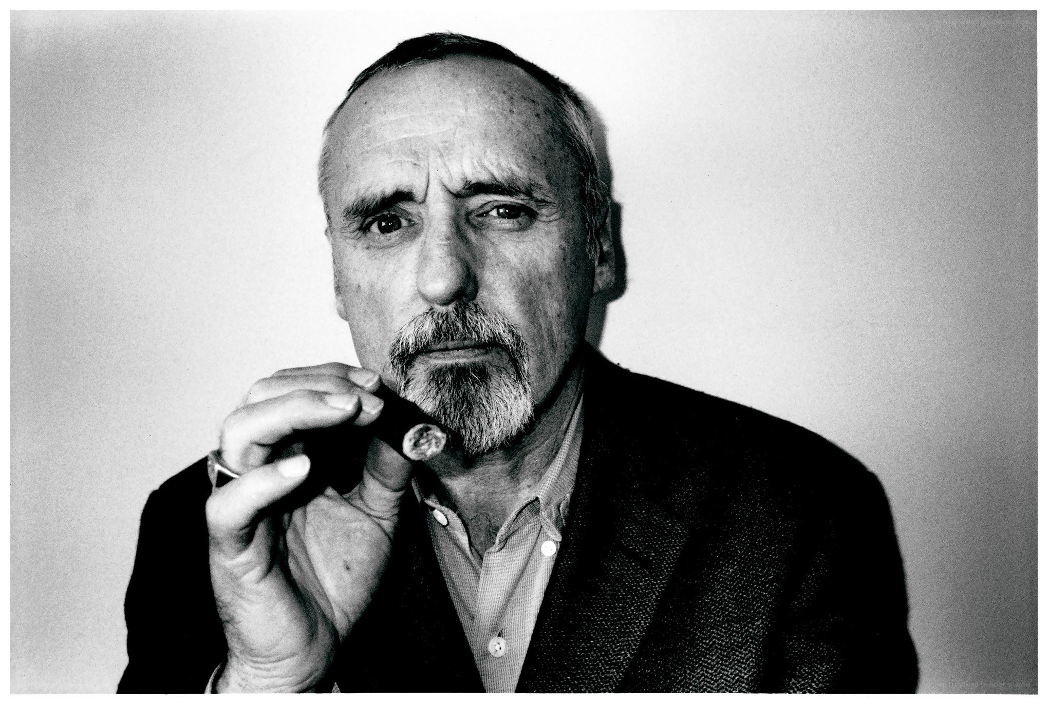 man holding a cigar