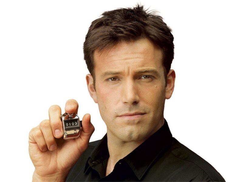 man holding a counter