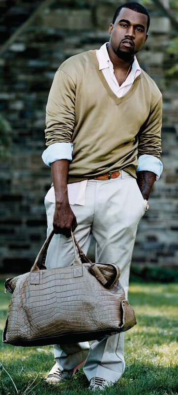 Man holding a crocodile bag