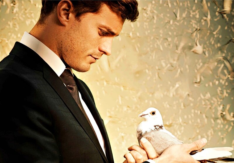 Man Holding a Dove — Black, Serene