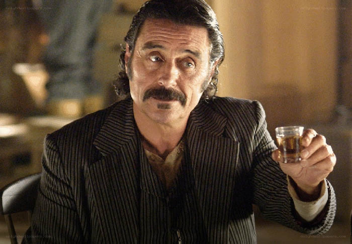 man holding a drink