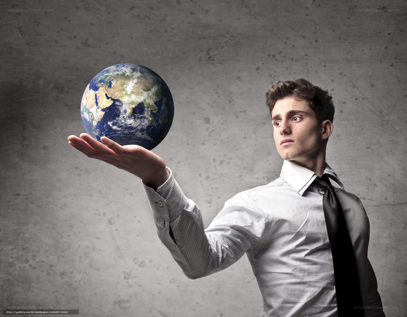 man holding a globe