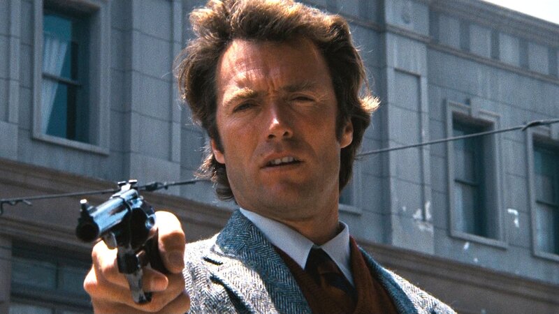 Man Holding a Gun — Blue, Dramatic, Afternoon
