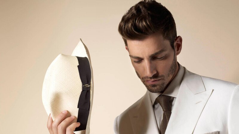Man Holding a Hat