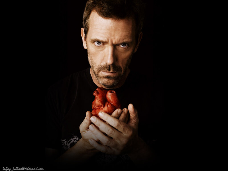 man holding a heart