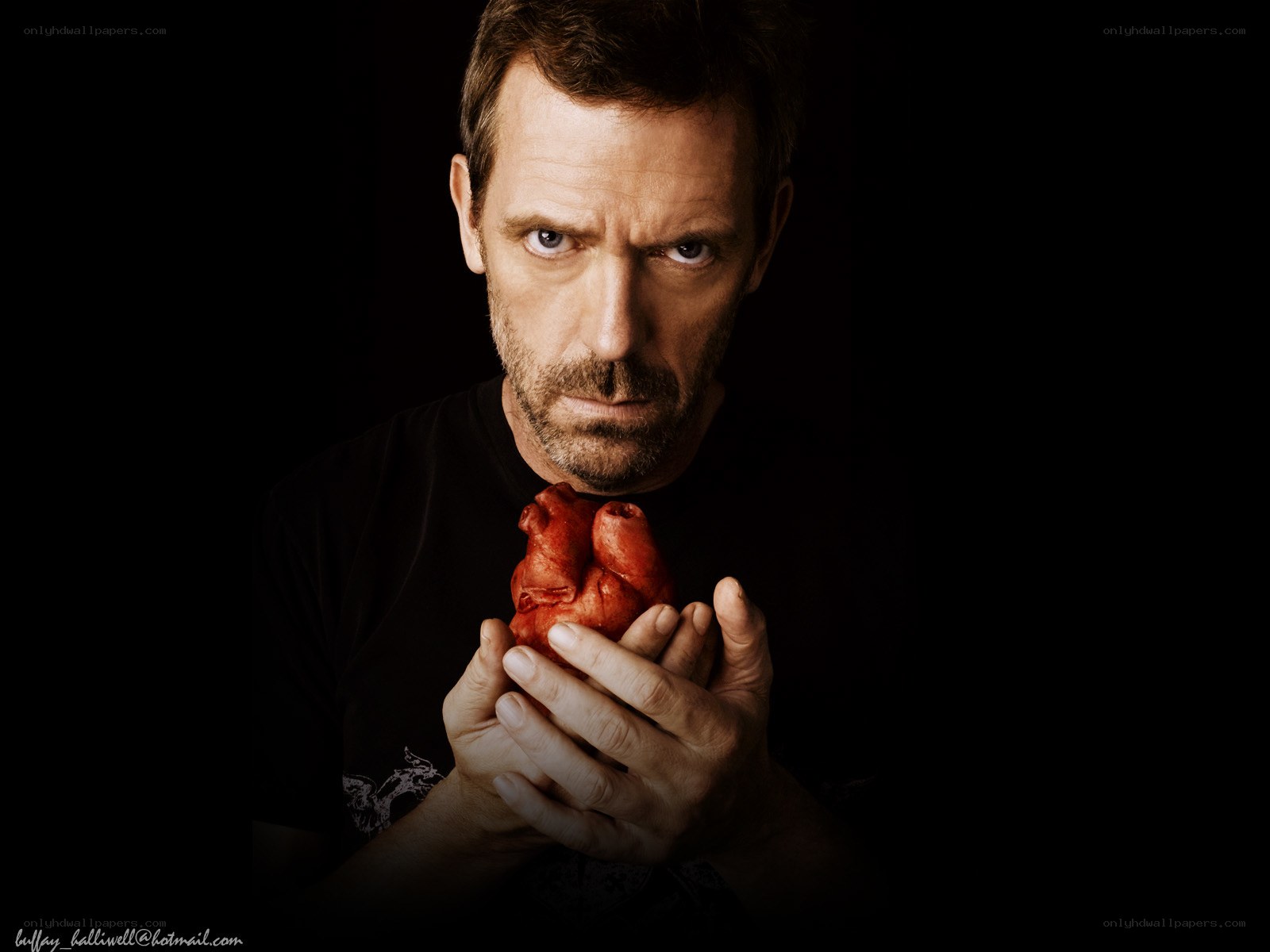 man holding a heart