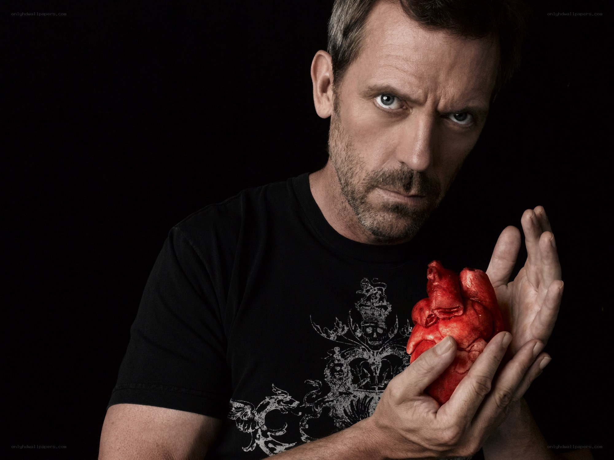 man holding a heart