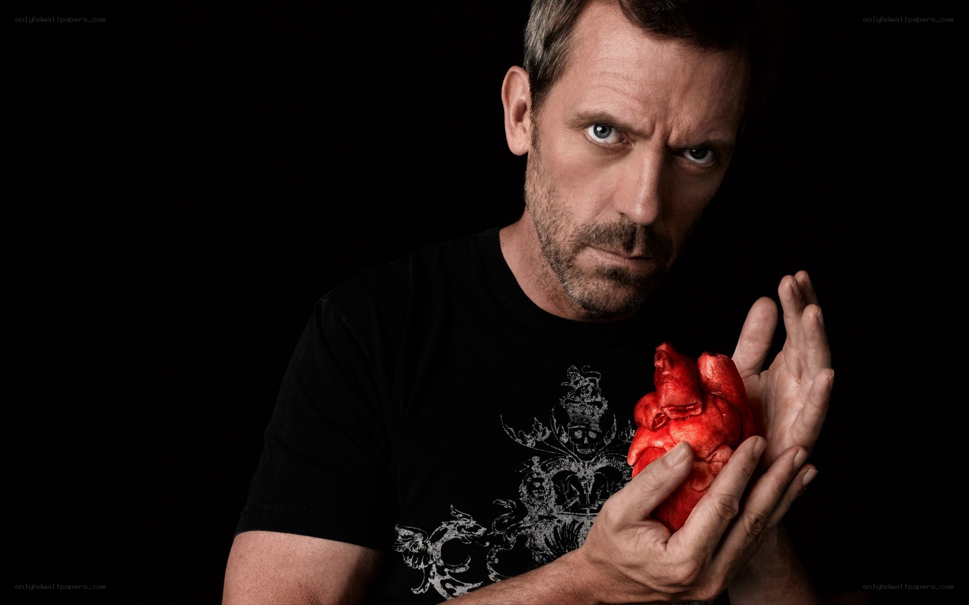 man holding a heart