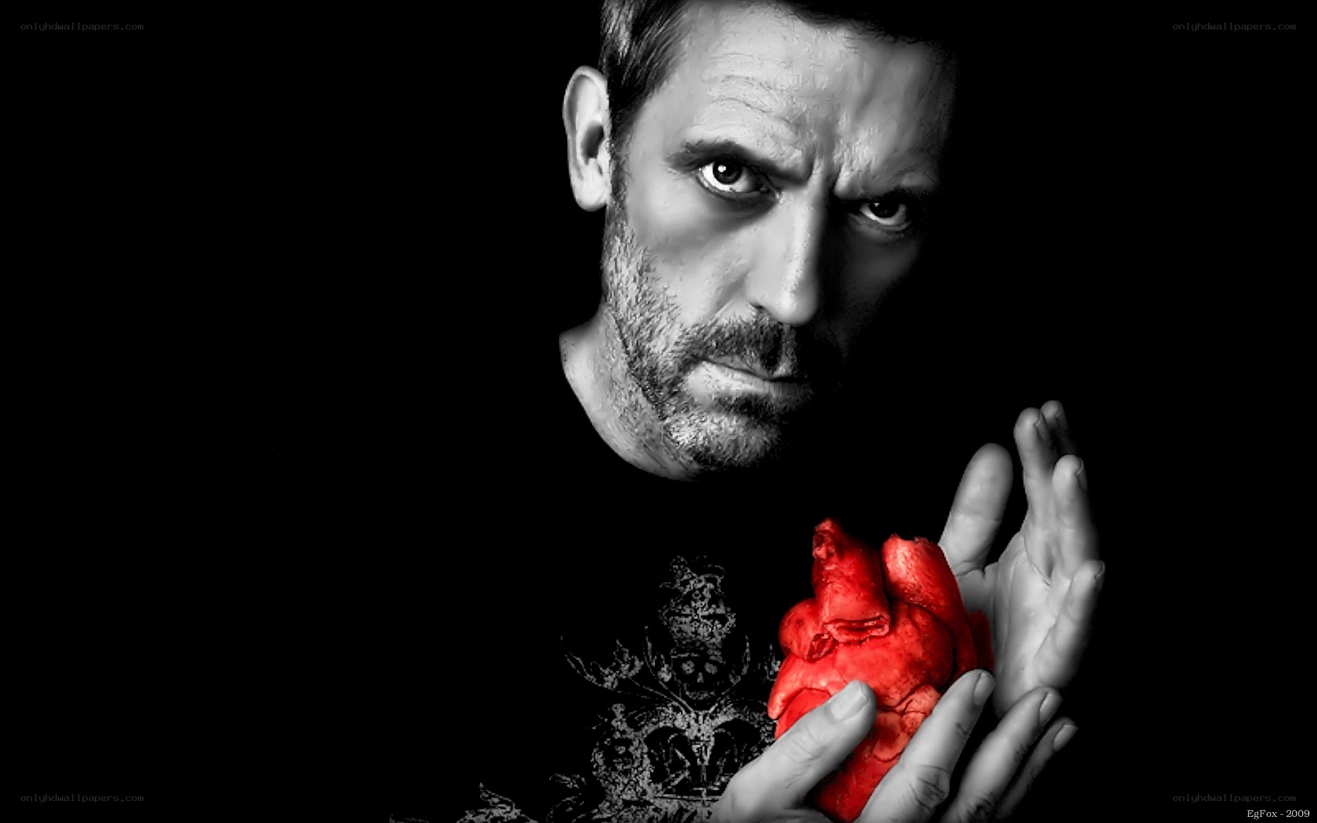 man holding a heart