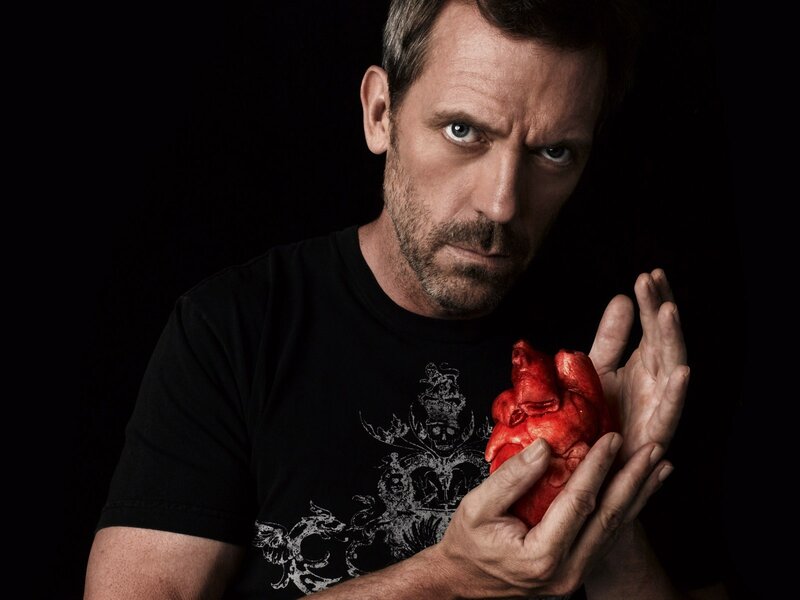 Man holding a heart model