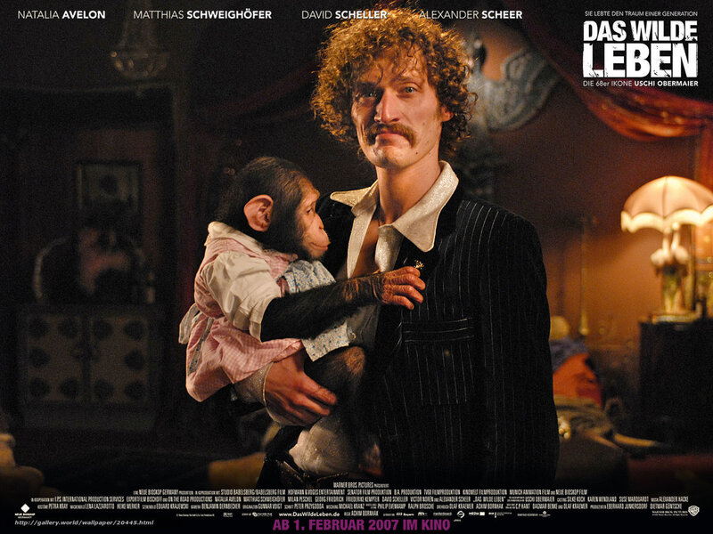 Man holding a monkey