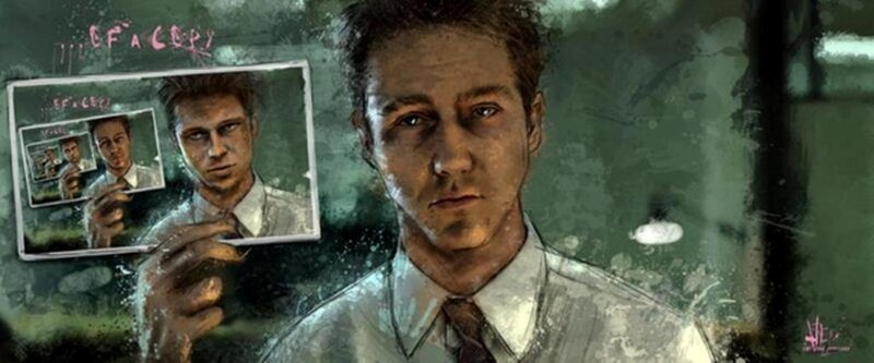 man holding a photo of himself