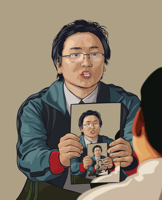 man holding a photo of himself