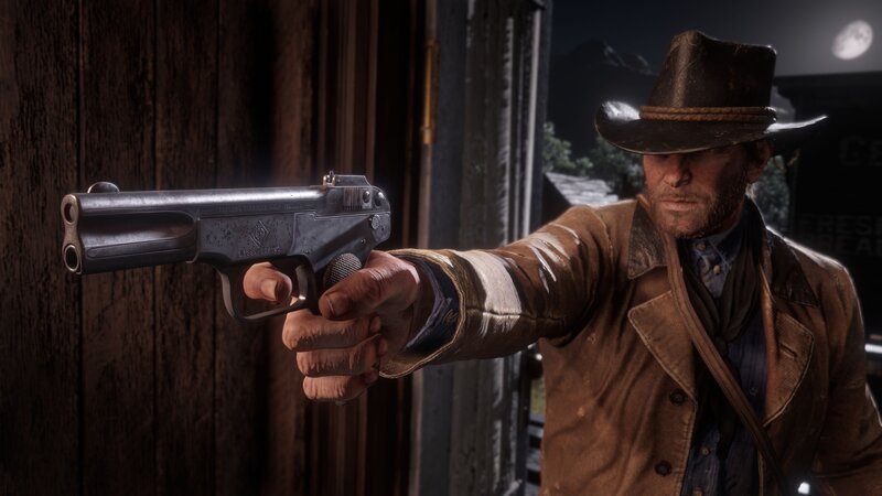 Man Holding a Pistol — Brown, Tense
