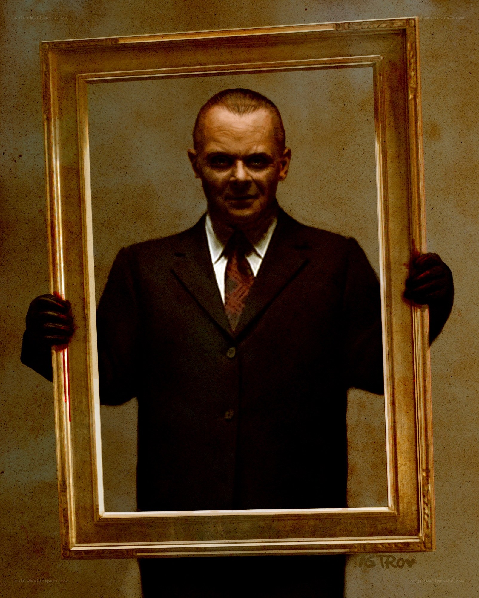 Man holding a portrait frame